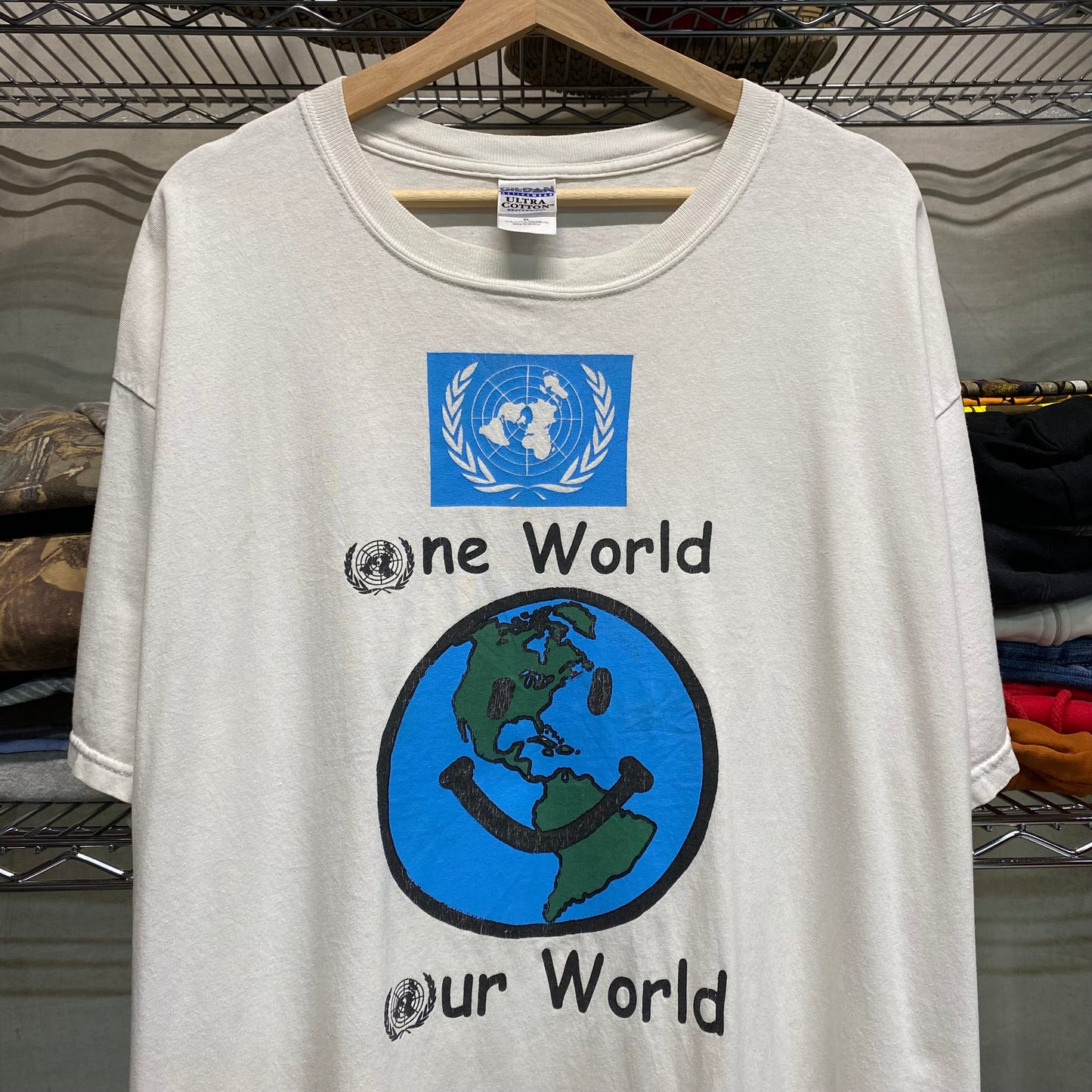 Early 2000s one world global survival tee